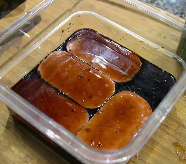 https://images.getrecipekit.com/20230125113843-smoked-spam-musubi-recipe-1.webp?width=700