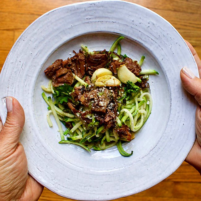 Image of braised beef and garlic over zucchini noodles
