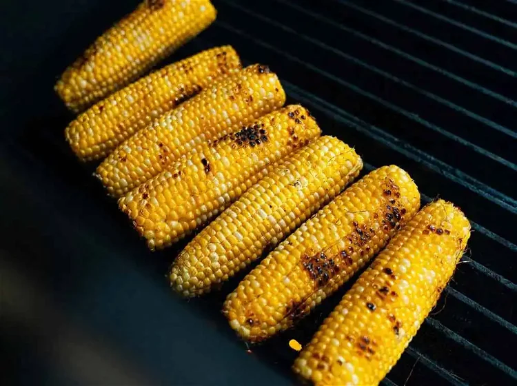 Image of Remove fresh corn from the husk and grill over direct...