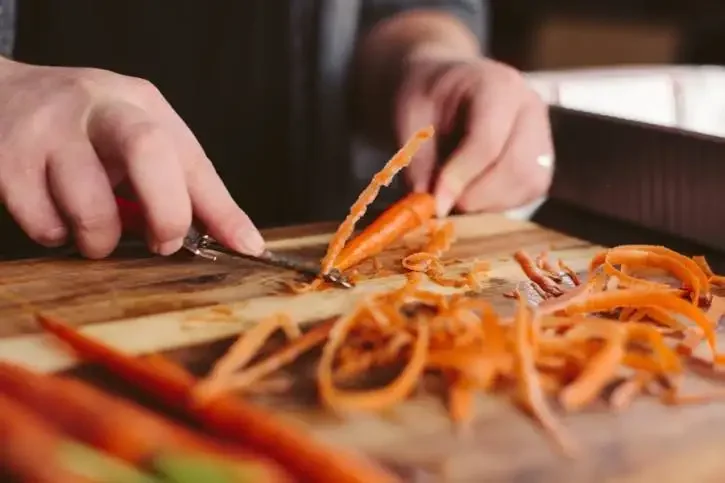 Image of Using smaller whole carrots allows the dish to cook quicker...