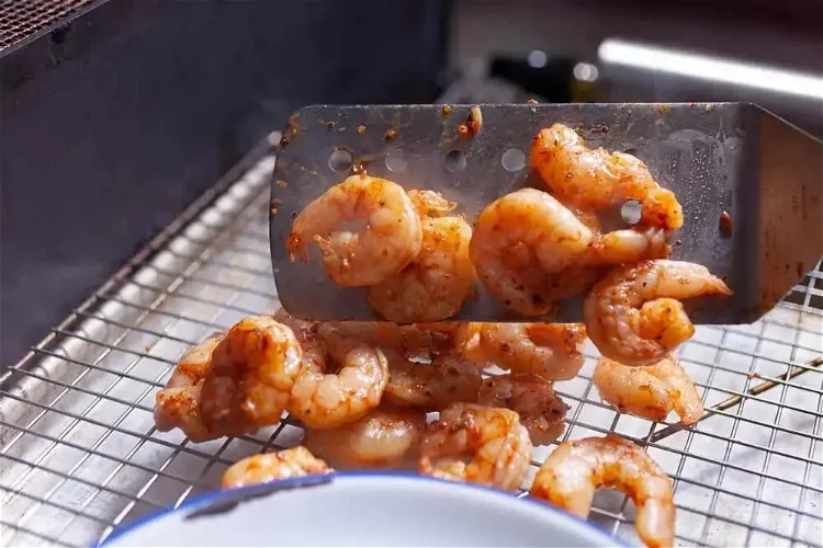 Image of When the shrimp are done, they will be opaque in...