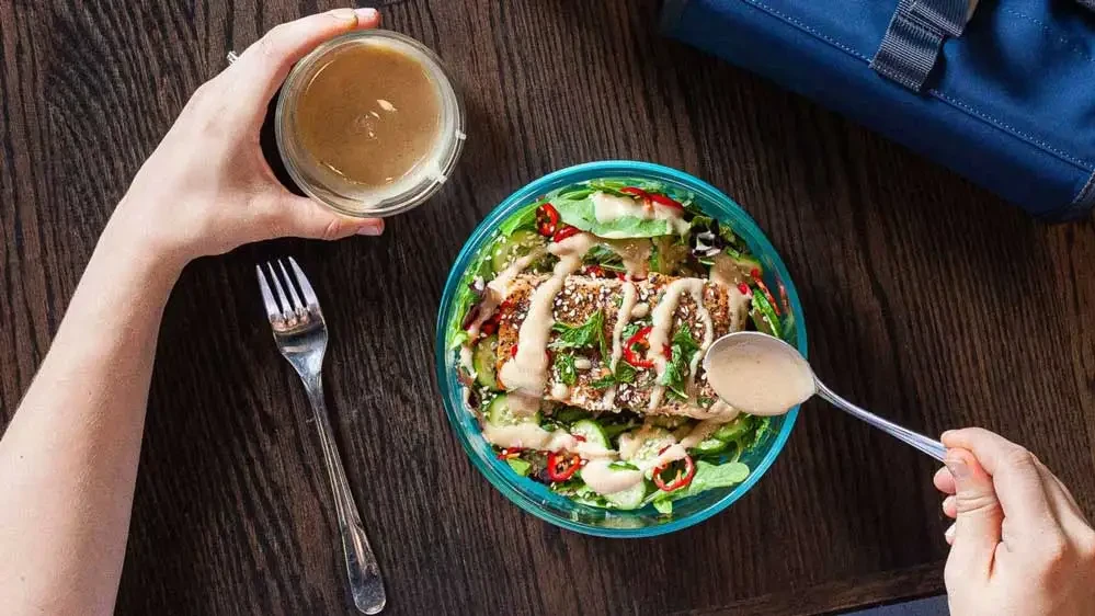 Image of Grilled Salmon Salad with Magic Tahini Dressing