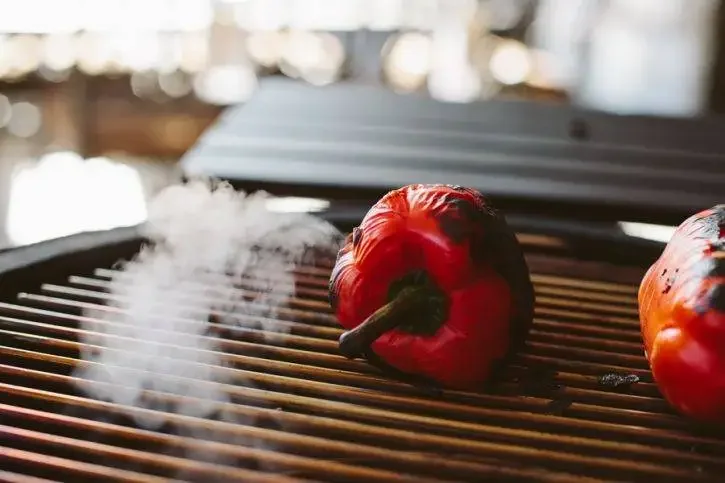 Image of Grilling the peppers both gives flavor and allows the skin...