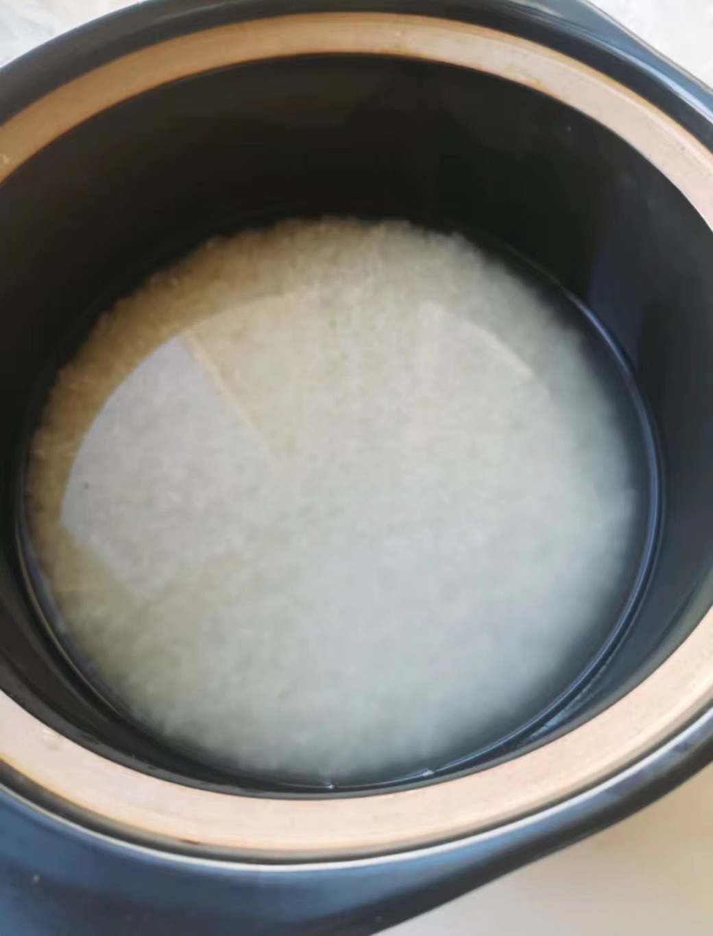 Image of Mergulhe o arroz em água quente por cerca de 15...