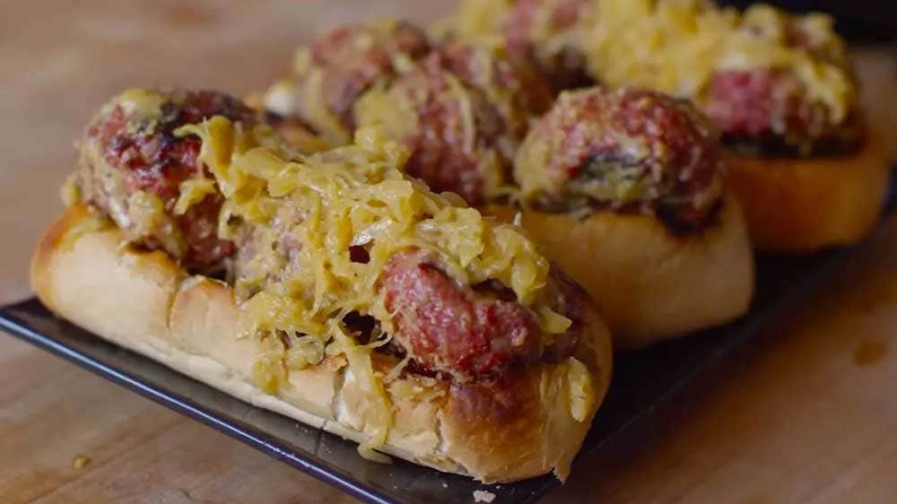 Image of Bratwurst Meatball Subs with Beer Infused Sauerkraut