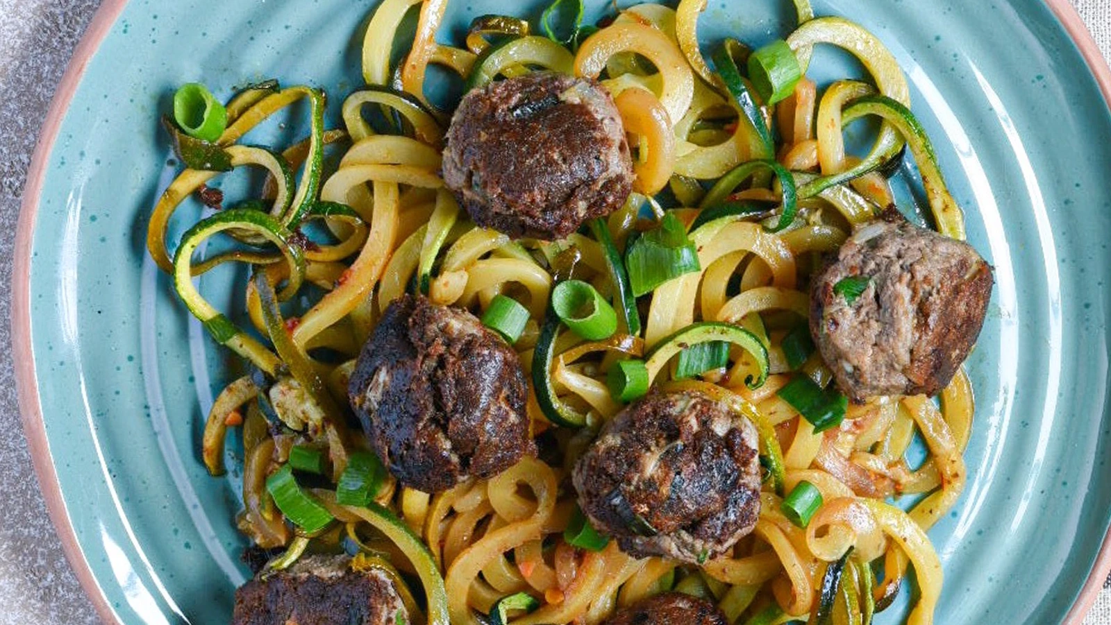 Image of Ginger Sardine Balls Over Asian Zucchini Noodles