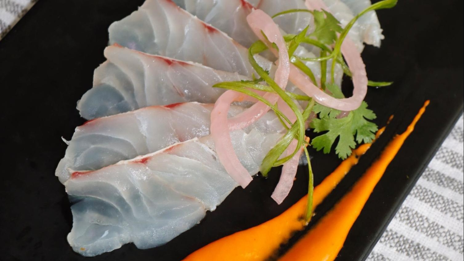 Red snapper Sashimi with roasted red pepper habanero aioli – Keys