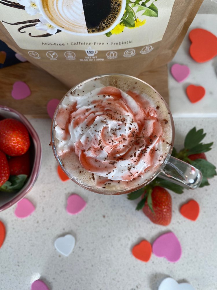Image of Top with whipped cream, additional strawberry syrup, shaved chocolate -...