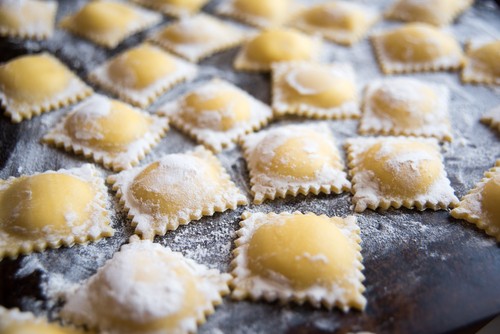 Image of Fresh Homemade Ravioli with Tomato Sauce: A Delicious and Satisfying Meal