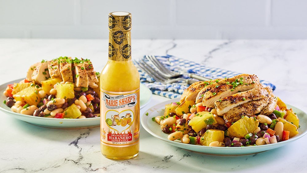 Image of Black and White Bean Salad with Charred Pineapple and Marie Sharp’s Orange Pulp Habanero Sauce