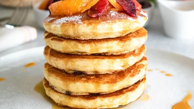 Image of Vegan Buttermilk Pancakes with Chocolate Chips and Orange Compote