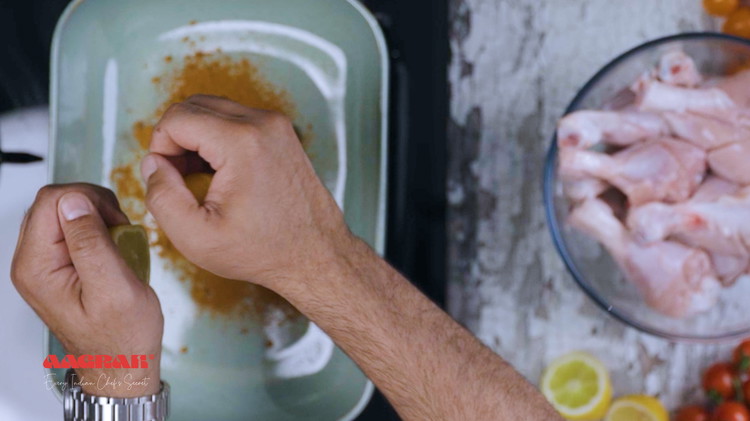 Image of Slice the lemons and squeeze the juice to the chicken