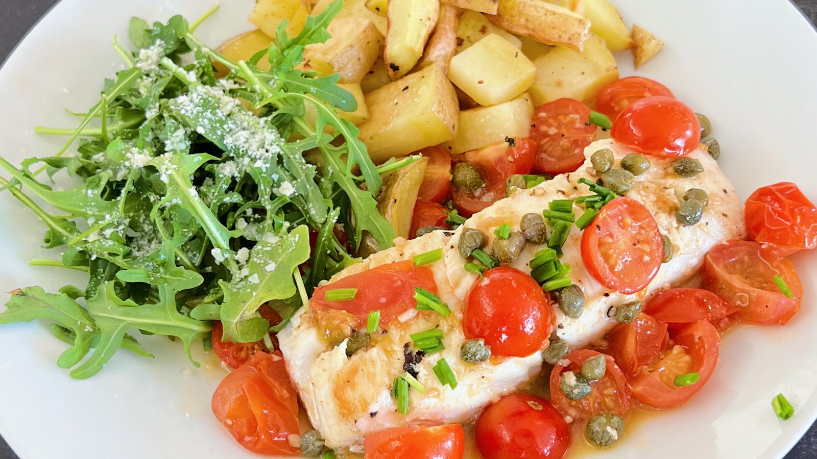 Image of Citrus Halibut with Cherry Tomatoes and Capers