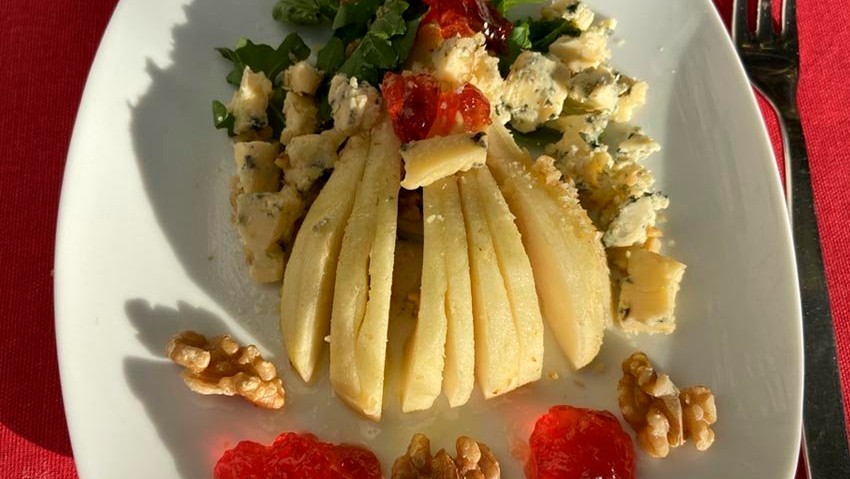 Image of Pear, stilton, walnut and crab apple salad
