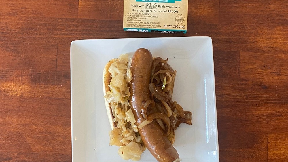 Image of BEER BRAISED SAUSAGE & CABBAGE WITH CARAMELIZED BOURBON ONIONS