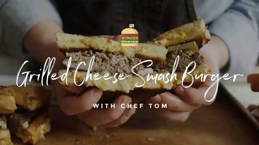 https://images.getrecipekit.com/20230301145900-how-to-make-a-grilled-cheese-smash-burger.jpg?class=16x9