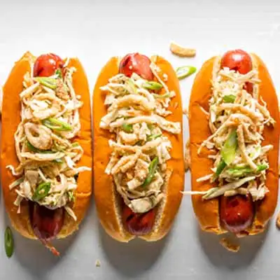 AMERICAN WAGYU HOT DOG WITH KIMCHI COLESLAW