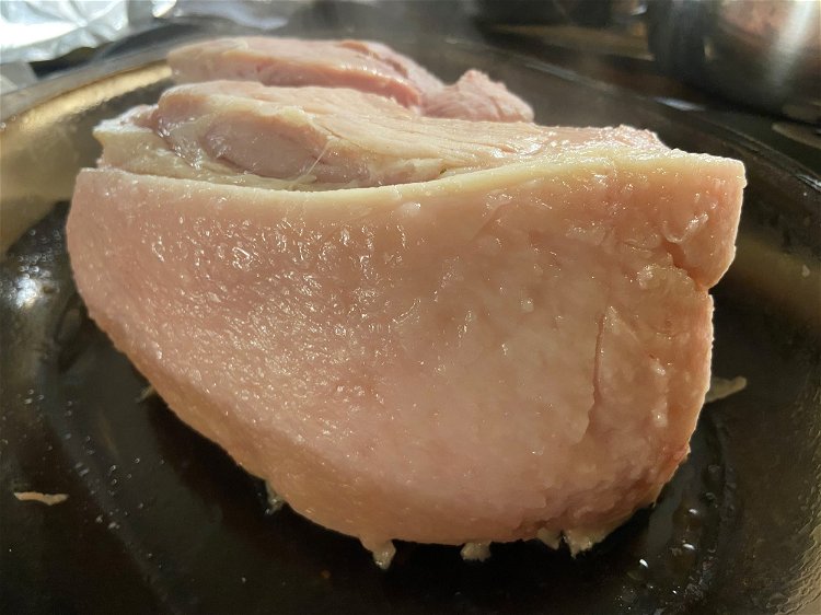 Image of Carefully pour cider round the meat so the base of...