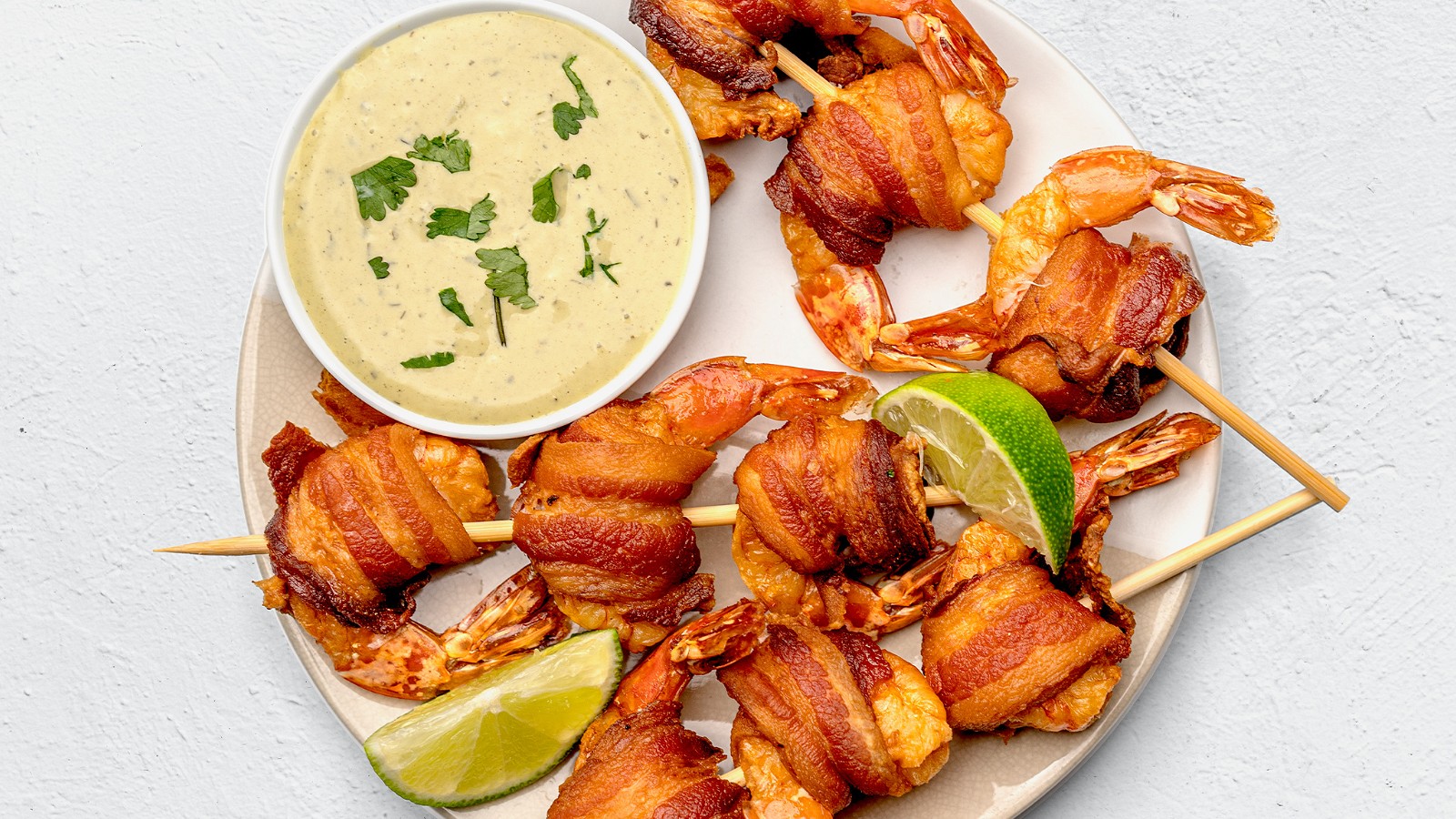 Image of Bacon Wrapped Shrimp with Avocado Lime Sauce