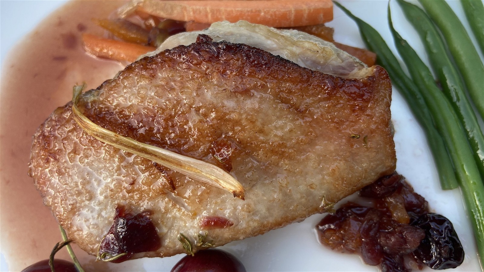 Image of Duck breasts with orange & morello cherry