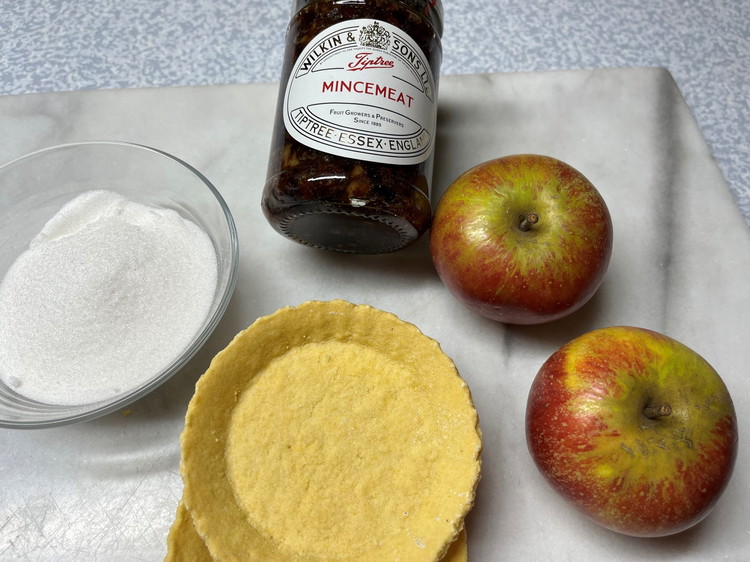 Image of Dust with icing sugar. Top with a cherry.  Serve with vanilla ice cream or fresh cream.