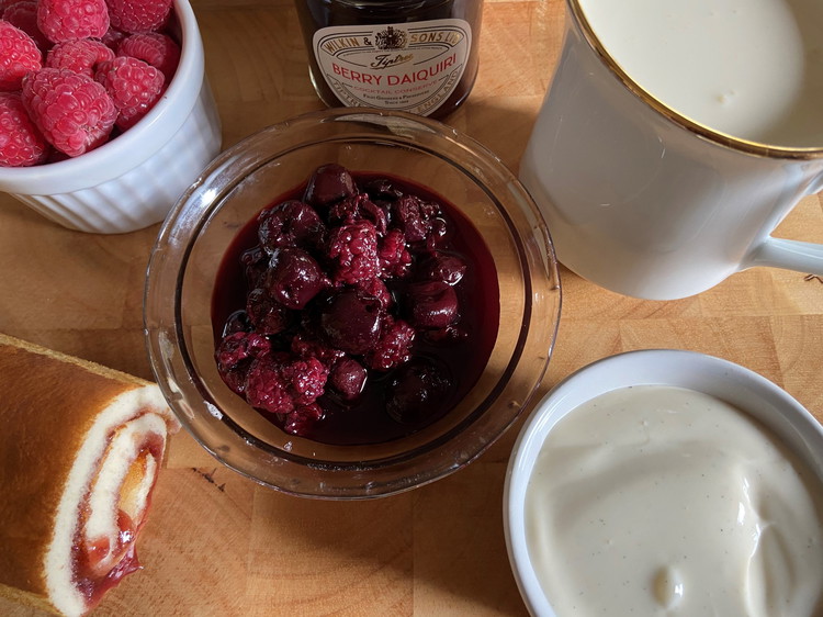 Image of Pour custard onto fruit