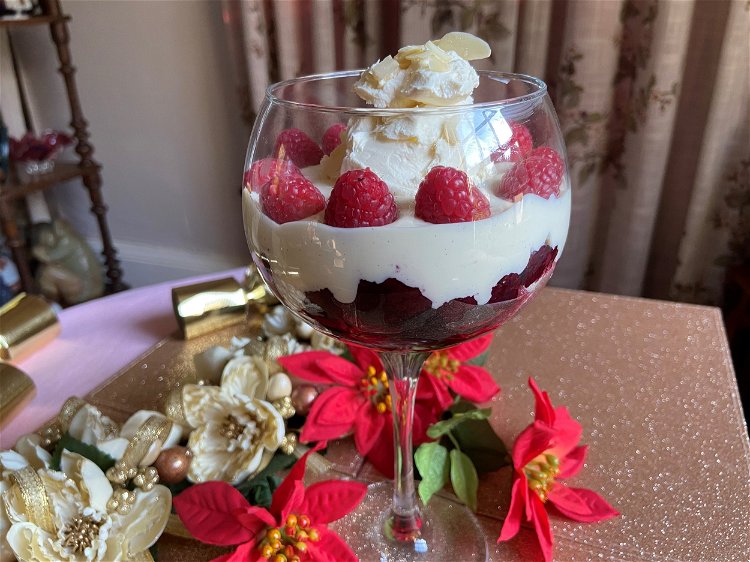 Image of Decorate with raspberries and top with a mound of cream,...