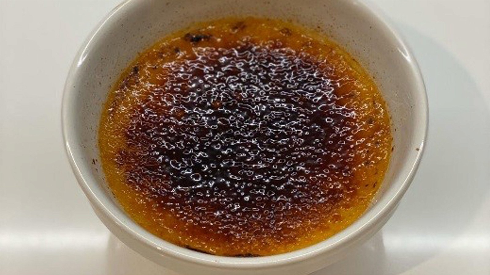 Image of Tiptree passion fruit curd crème brûlée