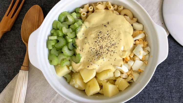 Image of Combine celery, macaroni, eggs, and potatoes with dressing. Combine well....