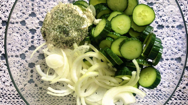 Image of Upon serving, combine cucumbers, onions, and sauce mixture. Mix well so all is evenly coated. Serve immediately. Alternatively, this recipe can be refrigerated for 2-3 days. The cucumber may be soggier after refrigeration, which is why it is best served...