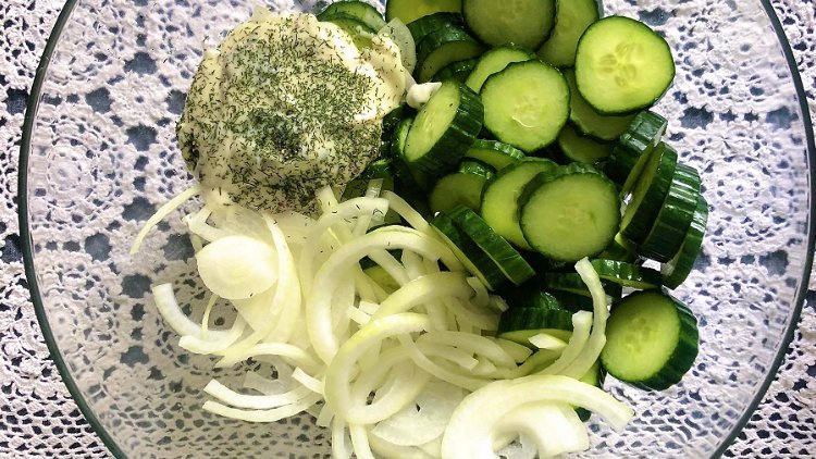 Image of Upon serving, combine cucumbers, onions, and sauce mixture. Mix well...