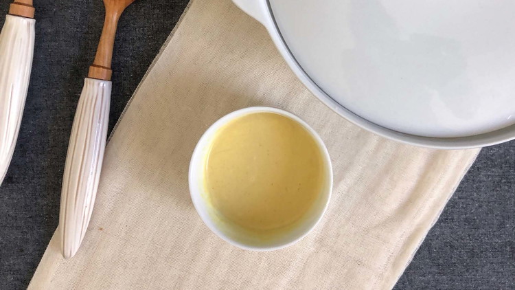 Image of Combine vinegar, sugar, mustard, milk, and seasoning for the dressing.