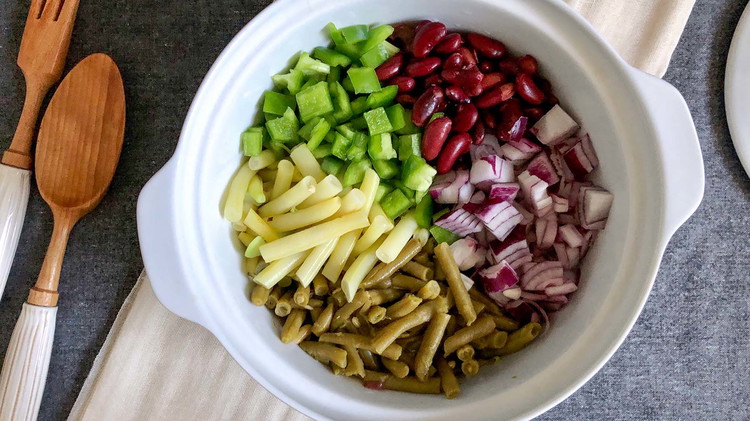 Image of Drain wax, green, and kidney beans then combine with bell pepper and onion. Set aside.