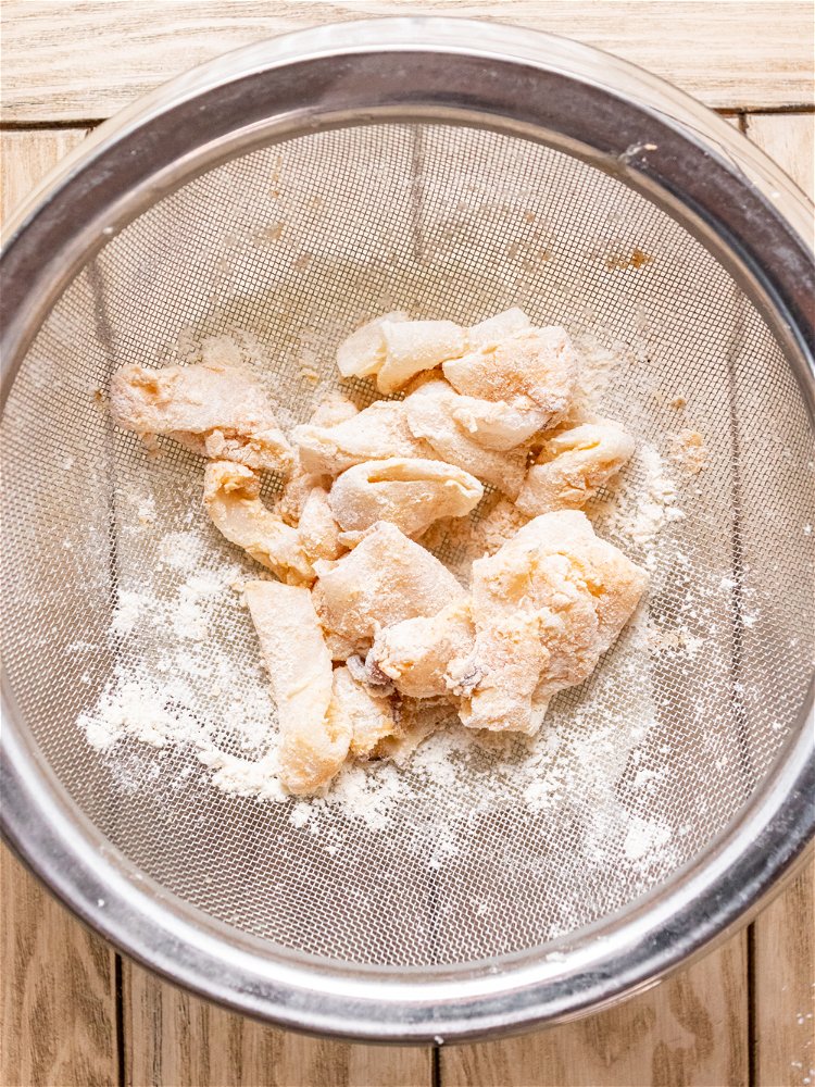 Image of In a separate shallow bowl, stir together flour, cornstarch, paprika,...