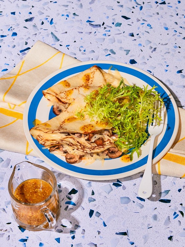 Image of Cheddar and Mushroom Crepes with a Sherry Vinaigrette Frisee Salad