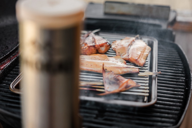 Image of Place your fish evenly spaced out on a rack in your bbq/smoker/smoke chamber or alternatively, hang from dowels in your smokehouse.