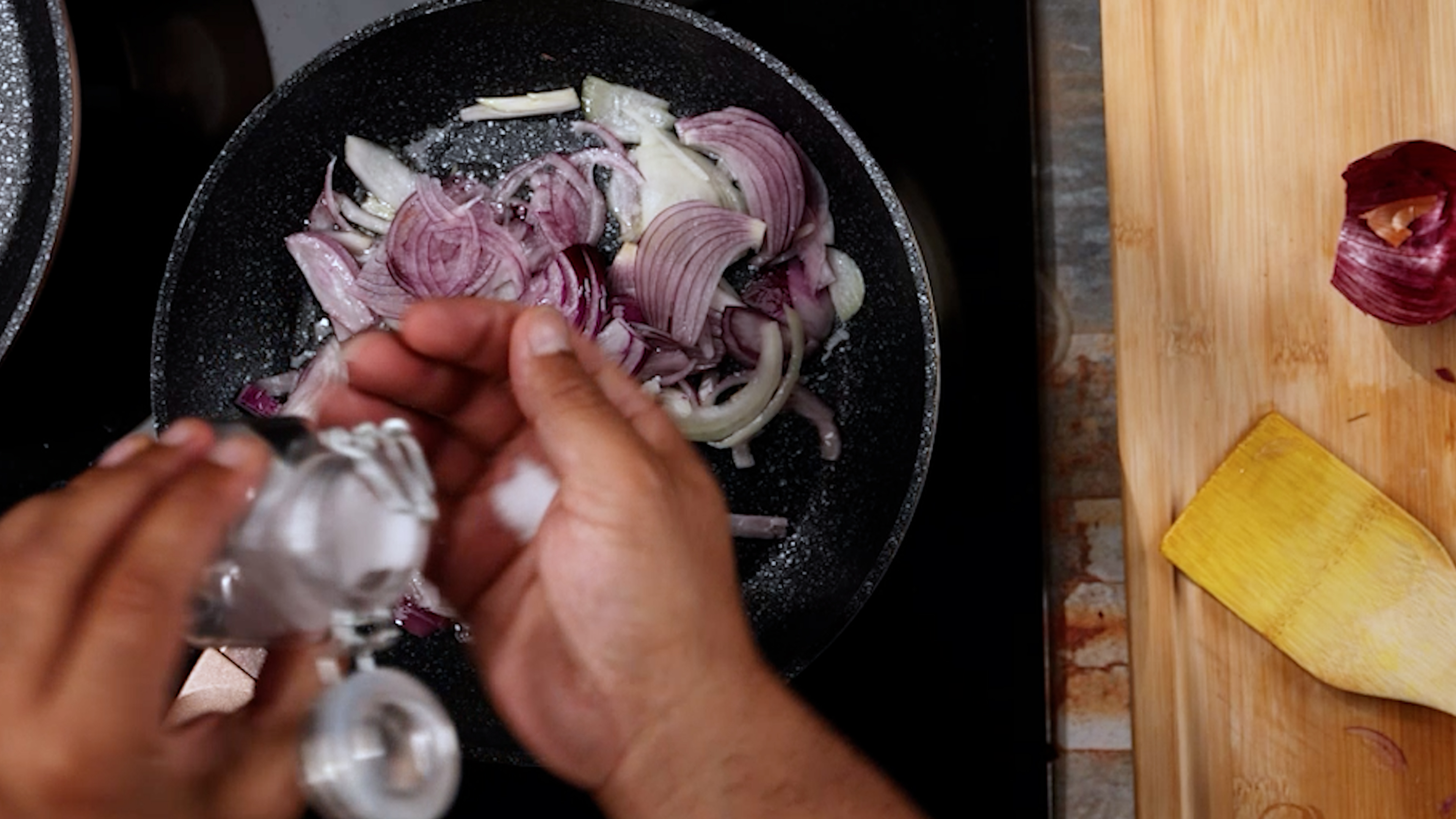 Image of Add the onions and salt to taste.