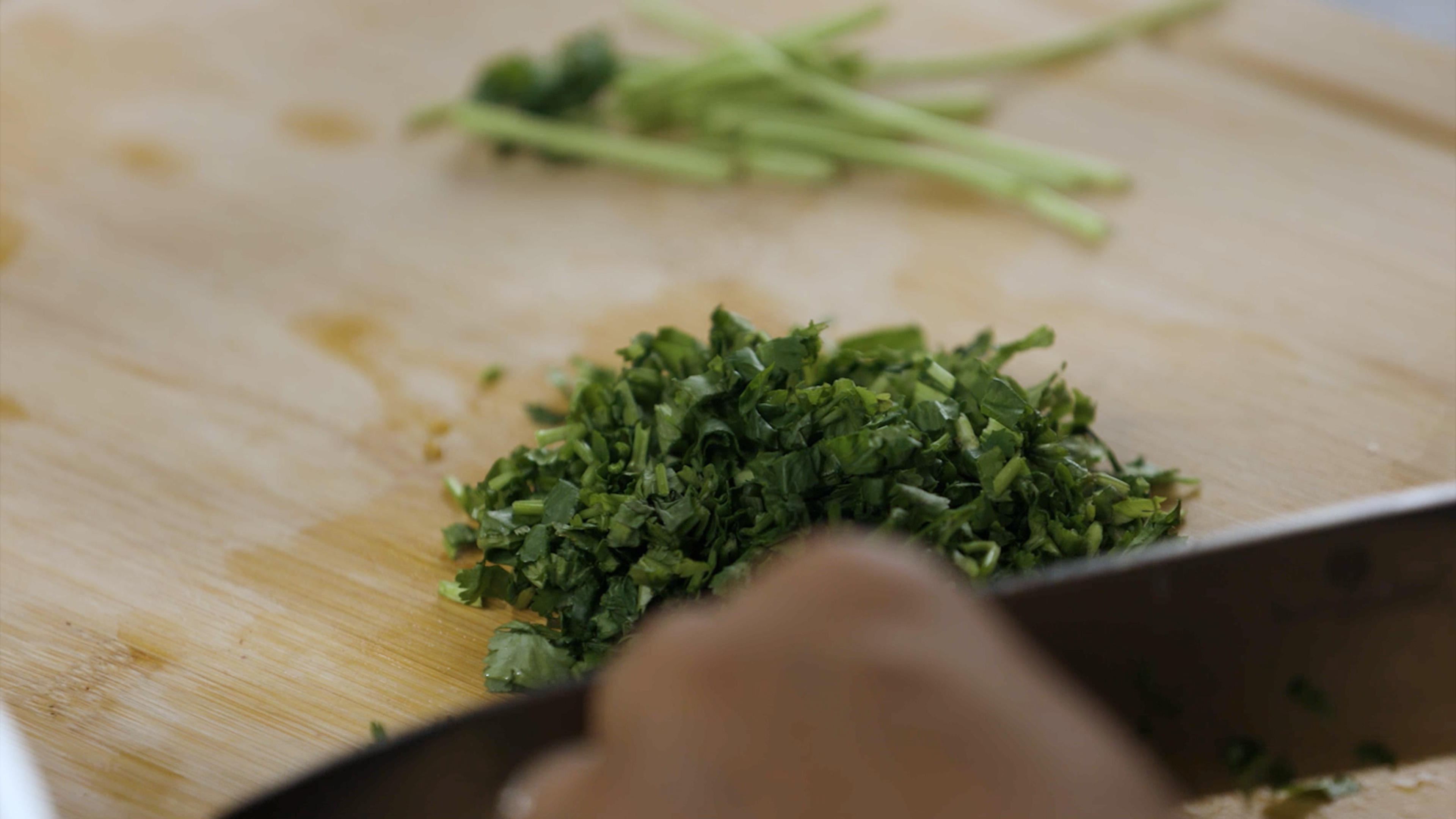Image of Finely chop the coriander and mint.