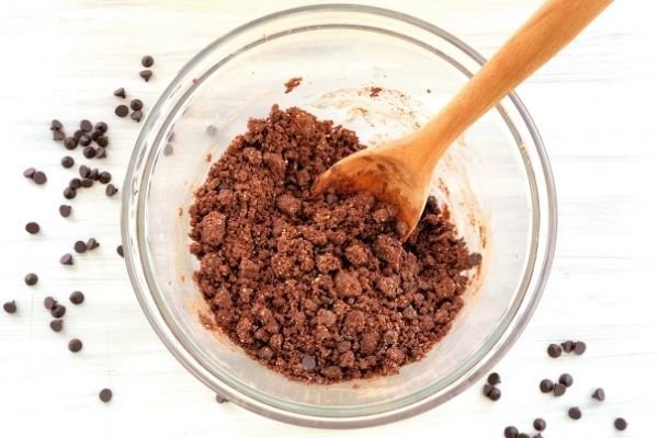 Image of Combine the dry ingredients (mix, cocoa and choc chips) in...