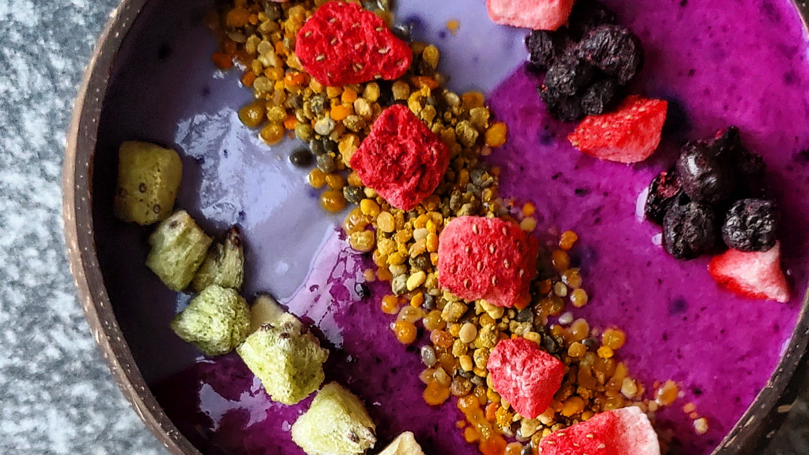 A colourful fruit breakfast bowl made using Haskapa