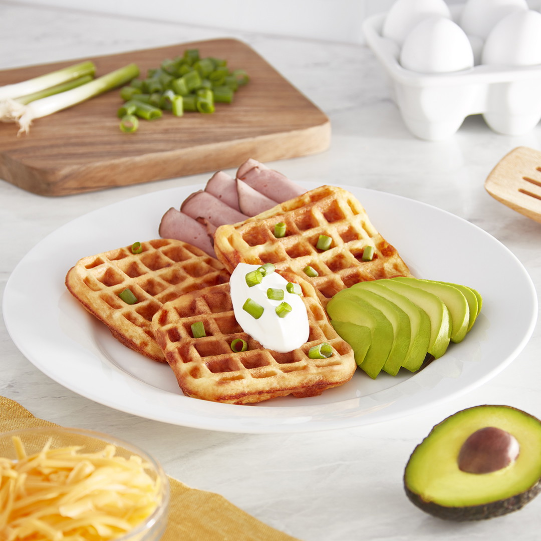Plate of 3 waffles with a Rise by Dash Mini Waffle Maker