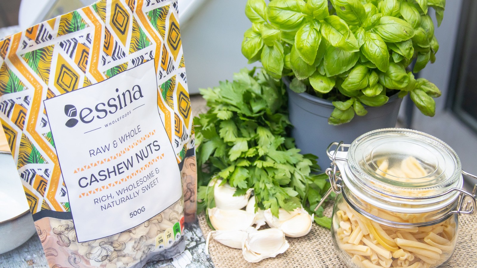 Image of Pesto with Cashew Nuts Served Over Pasta