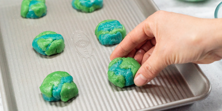 Image of Place on a cookie sheet and slightly flatten to form a marbled effect. 