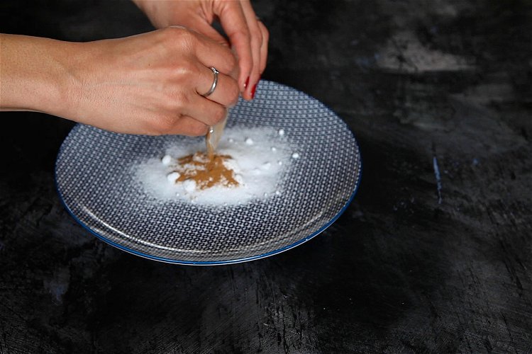 Image of On a plate, stir together the 85g sugar and cinnamon...