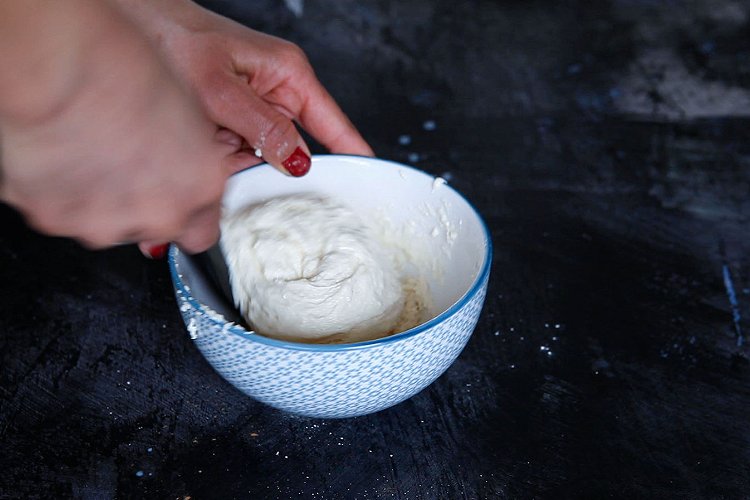 Image of Empty the sachet of churros mix into a bowl. Pour...
