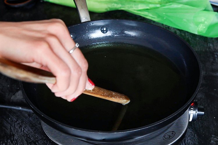 Image of Heat a shallow frying pan with oil ¾ of the...