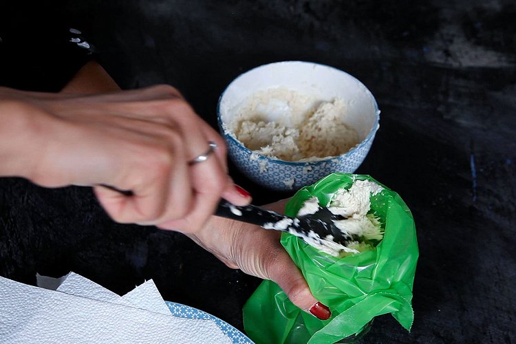 Image of Transfer the dough to the piping bag and snip off...