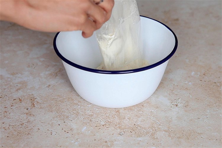 Image of Grease the foil pudding mould with a little butter or...