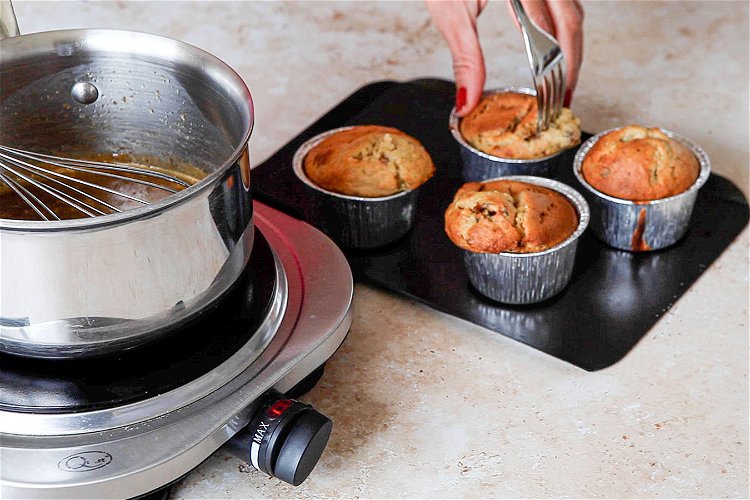 Image of Create more holes with the fork in all of the...