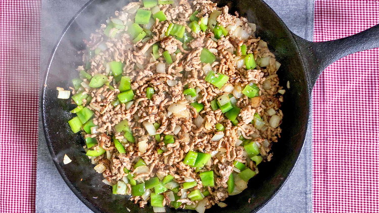 Image of Saute onion and pepper with beef and butter. Or cook beef separately and set aside.